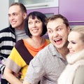 Four close friends enjoying a social gathering together Royalty Free Stock Photo