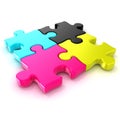 Four CMYK jigsaw puzzle pieces. Top view
