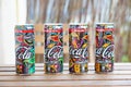 Four Coca Cola cans Royalty Free Stock Photo