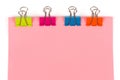 Four color clips on paper Royalty Free Stock Photo