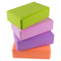 Four colored blocks for yoga, stack one on top of the other, concept, on a white background Royalty Free Stock Photo