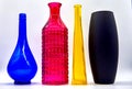 Four colored bottles are Radom, placed by color CMYK Royalty Free Stock Photo