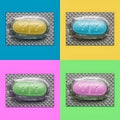 Four colored pills Royalty Free Stock Photo