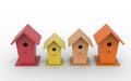 Four colorful birdhouses on a white background