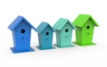 Four colorful birdhouses on a white background