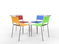 Four colorful chairs facing each other