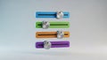 Four Colorful 3D Slider Controls with Metallic Knobs on a Light Blue Background volume Royalty Free Stock Photo