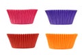 Four colorful empty muffin cups