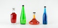 Four colorful glass bottles Royalty Free Stock Photo