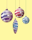 Four colorful hanging Christmas baubles. Decorative elements for holiday design. Vector Royalty Free Stock Photo