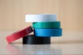 Four colorful insulating tapes to insulate the twist of electrical wires Royalty Free Stock Photo
