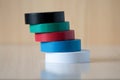 Four colorful insulating tapes to insulate the twist of electrical wires Royalty Free Stock Photo