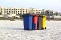 Four colorful recycle bins on Beach Sand- 21 JULY 2017.. Royalty Free Stock Photo