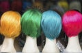 Four colorful wigs in Milan Royalty Free Stock Photo