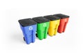 Four colorfull plastic garbage bins with recycling logo, staked on row.