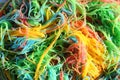 Mess of colored noodles