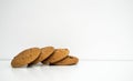 Four cookies on a white background. Horizontal photo