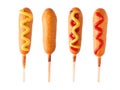 Four corn dogs with different toppings isolated on white