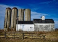 Four Corn Silos and a Barn Royalty Free Stock Photo