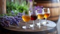 Four Craft Beer Samples on Wooden Barrel with Lavender Royalty Free Stock Photo