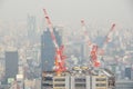 Four cranes on a new building