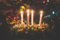 Four burning advent candles background Royalty Free Stock Photo