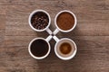 Four cups of coffee. Four phases of coffee drink Royalty Free Stock Photo