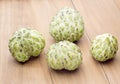 Four custard apple on wooden board Royalty Free Stock Photo