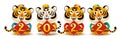 Four cute tigers with 2022 sign. Chinese New Year. Year of the tiger