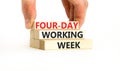 Four-day working week symbol. Concept words Four-day working week on wooden block on a beautiful white table white background. Royalty Free Stock Photo