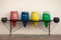 Four decorative trash bins in the form of vases for sorting of waste. The concept as it is possible to equip beautifully