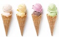 Four delectable ice cream scoops in varying flavors - vanilla, lemon, strawberry, and mint chocolate chip - sit atop Royalty Free Stock Photo