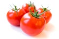 Four delicious ripe red tomatoes on white background. Royalty Free Stock Photo