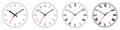 Four different clock faces over white