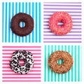 Four different donuts on striped multicolored stripes background top view