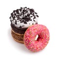 Four different donuts on white background top view