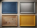 Four different empty picture frames in blue, silver, wood, and yellow colors arranged on a wall Royalty Free Stock Photo