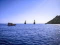 Four different sea vessels against the background of the sea horizon off the coast of Alanya Turkey. Silhouettes of a pirate Royalty Free Stock Photo