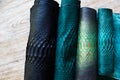 Four different tones of trendy green painted snake python skin surface Royalty Free Stock Photo