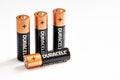 Four AA alkaline batteries of the Duracell brand