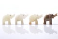 Four dwarf elephant statuettes