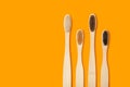 Set of four eco-friendly bamboo toothbrushes