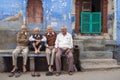 Four elderly men