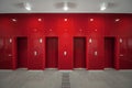 Four elevator doors in a red wall. Royalty Free Stock Photo