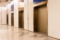 Four elevators in hotel lobby. Royalty Free Stock Photo