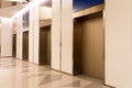 Four elevators in hotel lobby. Royalty Free Stock Photo