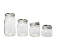 Four empty glass jar Royalty Free Stock Photo