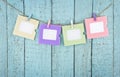 Four empty photo frames hanging with clothespins Royalty Free Stock Photo