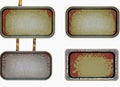 Four empty vintage tin signs on a white background