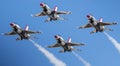 Four F-16 usaf Thunderbirds flying in the diamond formation with a blue sky Royalty Free Stock Photo